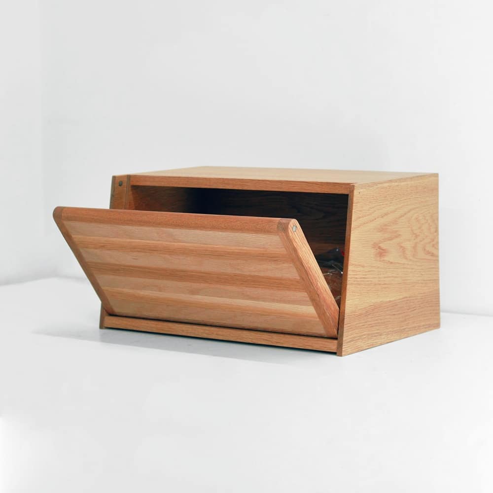 February 23rd, 2021: The door of our oak bread box uses magnets to pivot open, click closed, and easily pop out to act as a cutting board!